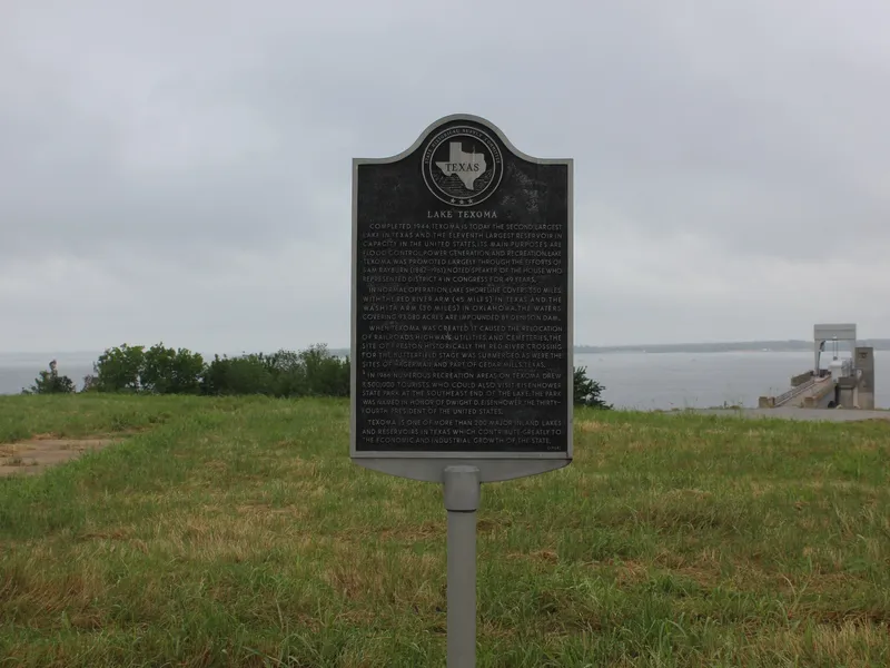 The marker for Lake Texoma is located at the overlook on the Texas side just before the Denison Dam.