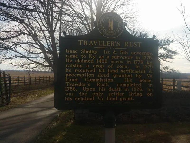 Kentucky Historical Marker #2233 at the entrance to Isaac Shelby Cemetery. Obverse: "Isaac Shelby, 1st &amp; 5th governor, came to Ky. as a surveyor in 1775. He claimed 1400 acres in 1776 by raising a crop of corn. In 1779 he received 1st land settlement &amp; preemption deed granted by Va. Land Commission. His home, Traveler's Rest, completed in 1786. Upon his death in 1826, he was the only settler living on his original Va. land grant." Reverse: "Settled 1776. This property was placed on the National Register of Historic Places in 1976 by the United States Department of the Interior."